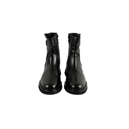 Pair of black leather boots on a white background