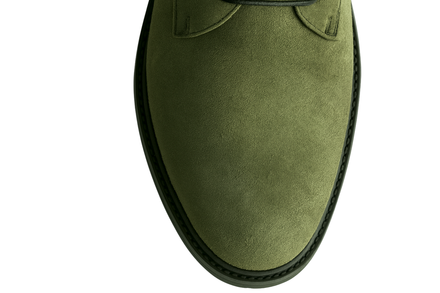 Green suede shoe on a white background